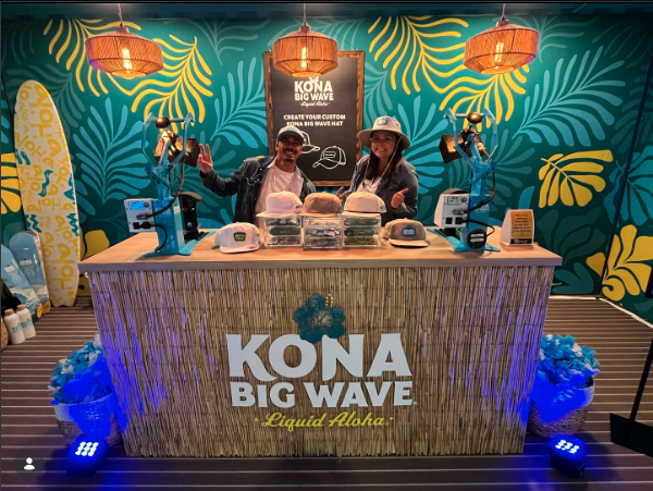 Kona Big Wave brand activation booth staffed by Karma Casting brand ambassadors